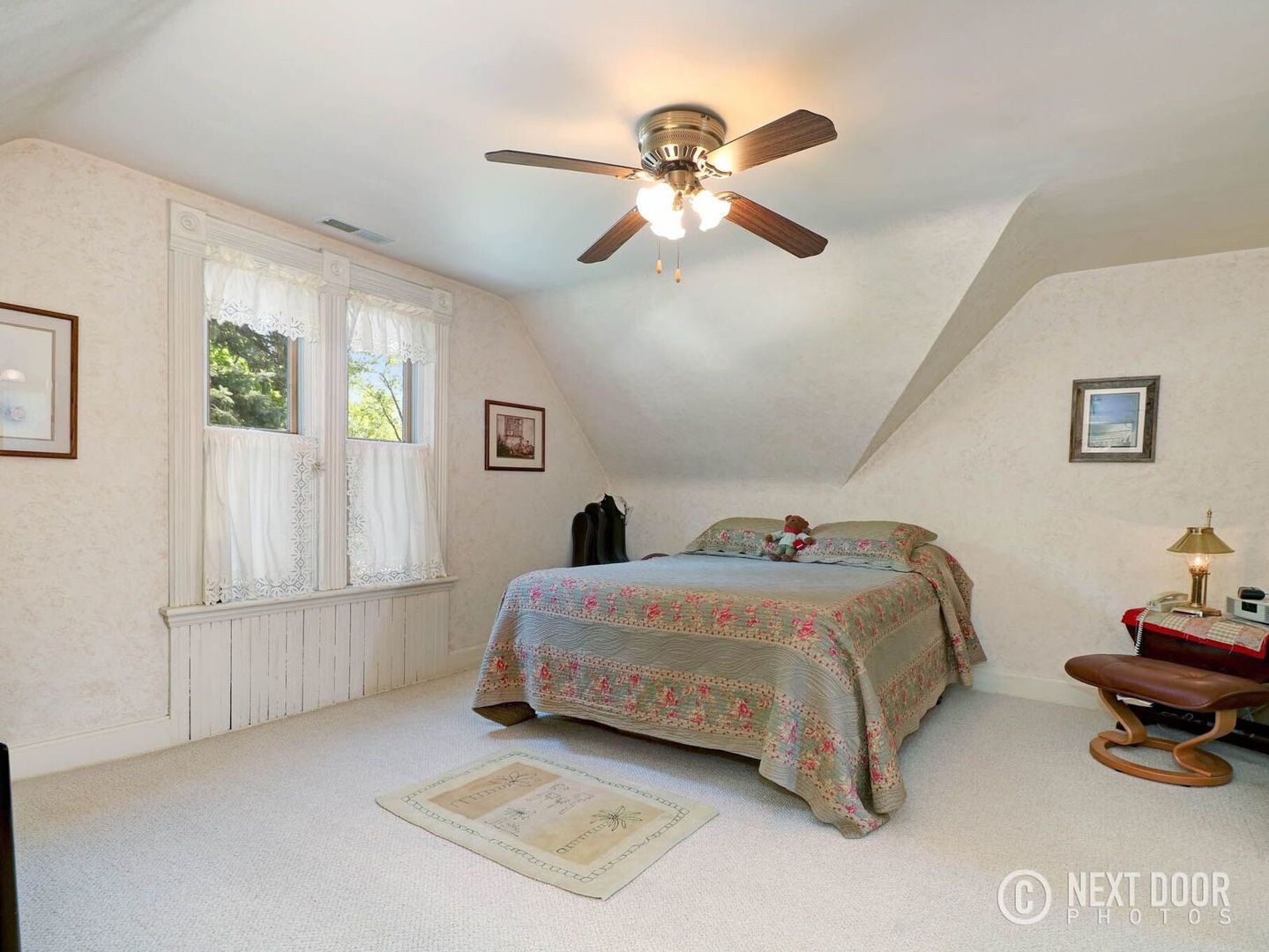 125 South Maple Street Itasca, IL 60143 - Photo 17 of 24 a bedroom with a bed and a chandelier