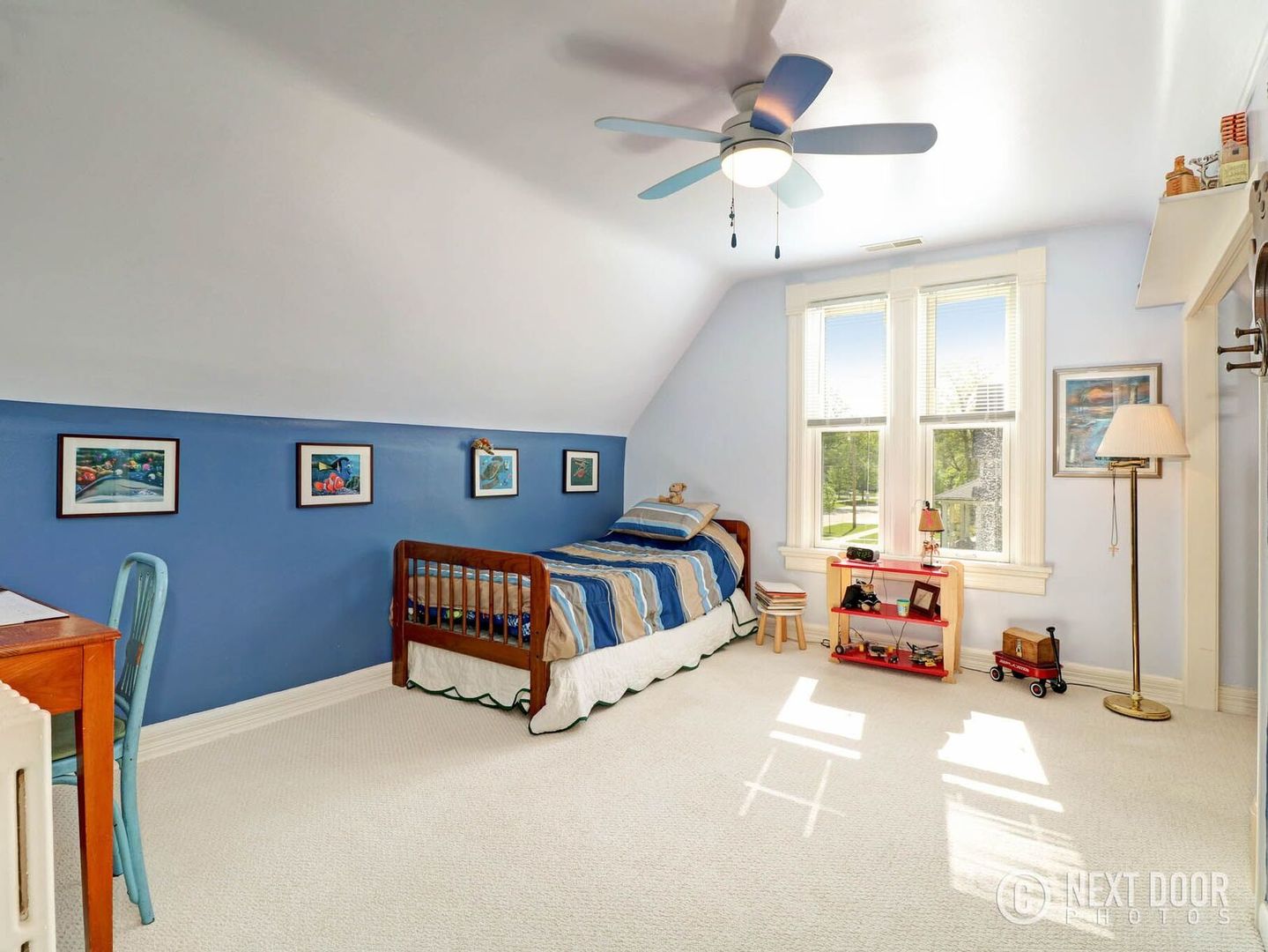 125 South Maple Street Itasca, IL 60143 - Photo 18 of 24 a bedroom with furniture and a large window
