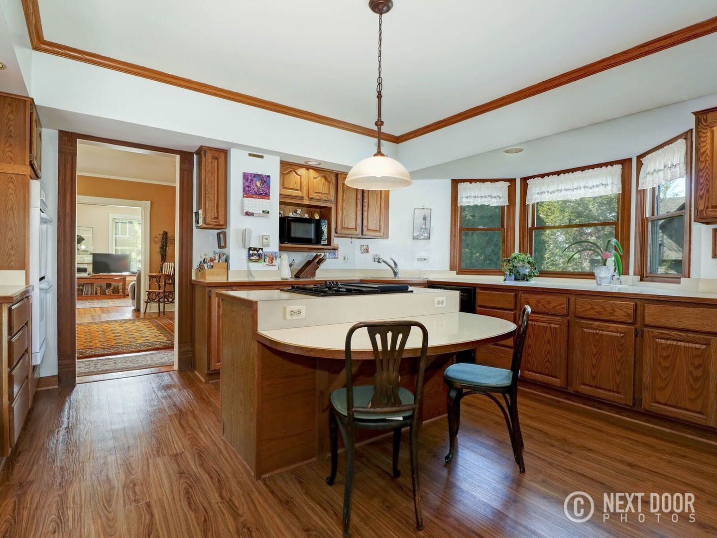 125 South Maple Street Itasca, IL 60143 - Photo 8 of 24 a view of a dining room with furniture window and wooden floor