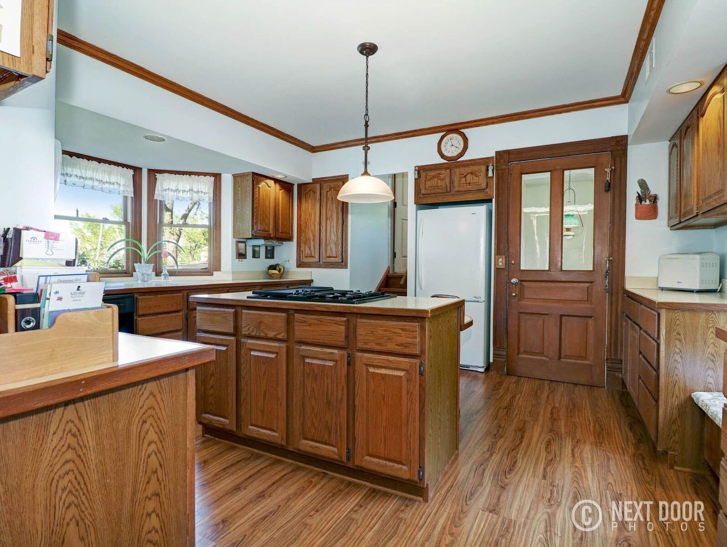 125 South Maple Street Itasca, IL 60143 - Photo 9 of 24 a kitchen with a sink a counter space appliances and cabinets