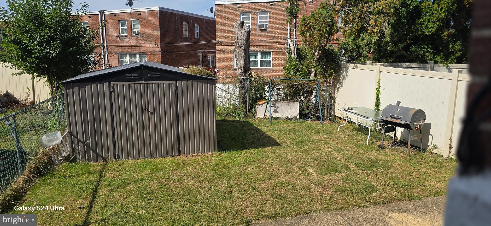 2806 Walnut Hill Street Philadelphia, PA 19152 - Photo 21 of 34 a front view of a house with garden