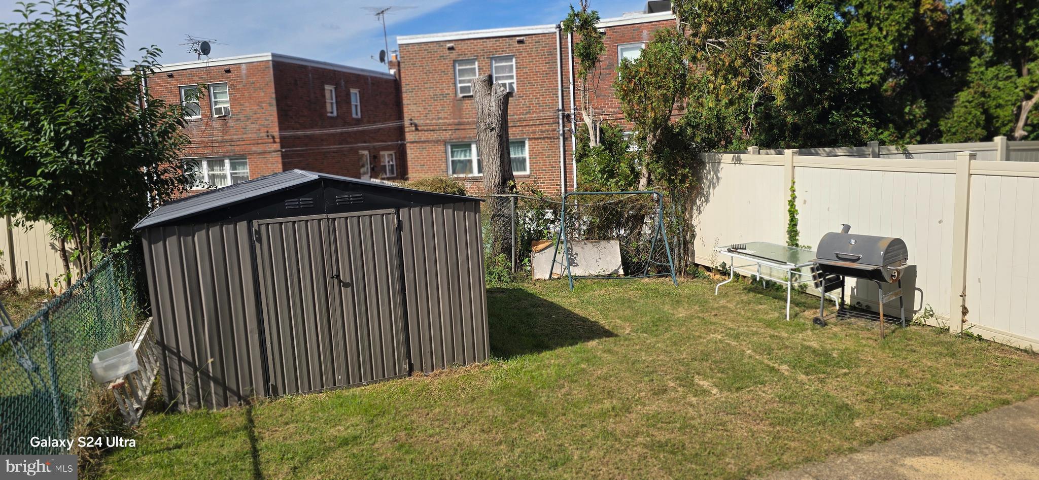 2806 Walnut Hill Street Philadelphia, PA 19152 - Photo 22 of 34 a view of a house with backyard and sitting area