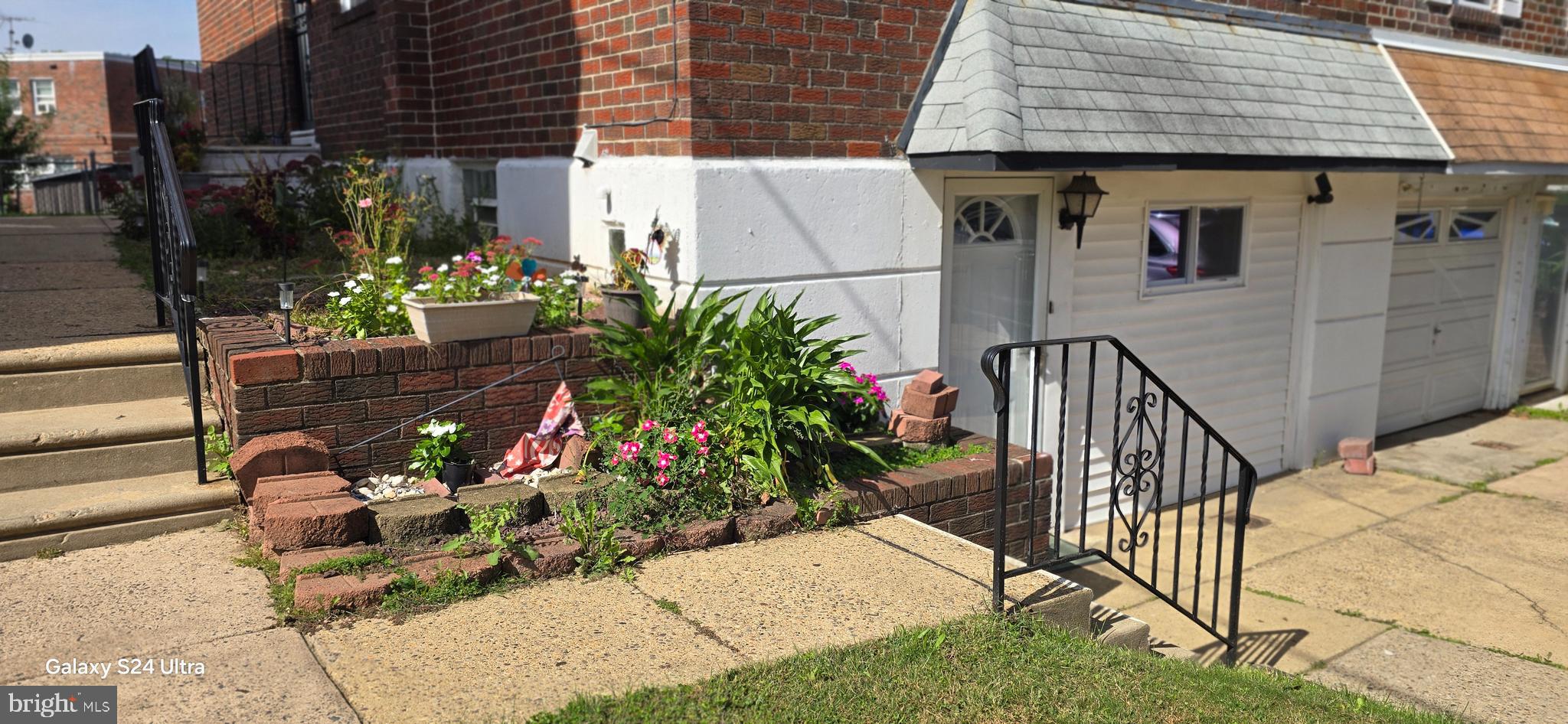2806 Walnut Hill Street Philadelphia, PA 19152 - Photo 5 of 34 a view of a house with backyard and sitting area