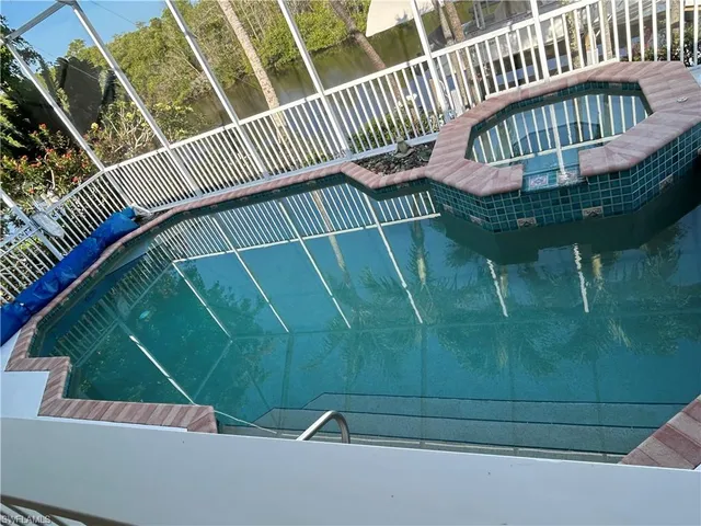 a view of outdoor space with deck and furniture