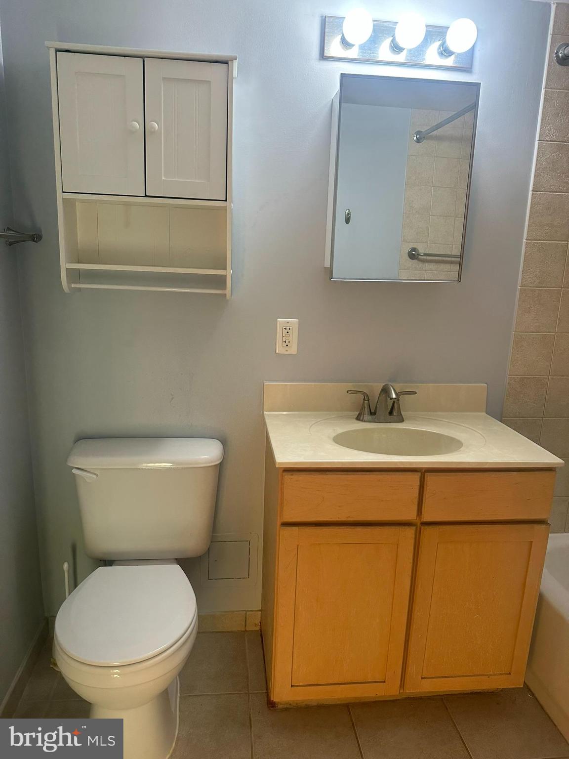 800 4th Street Southwest, Unit S325 Washington, DC 20024 - Photo 11 of 17 a bathroom with a toilet sink and mirror