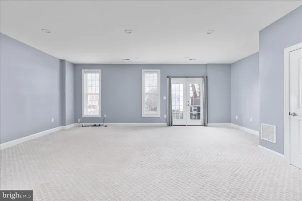 a view of an empty room with window