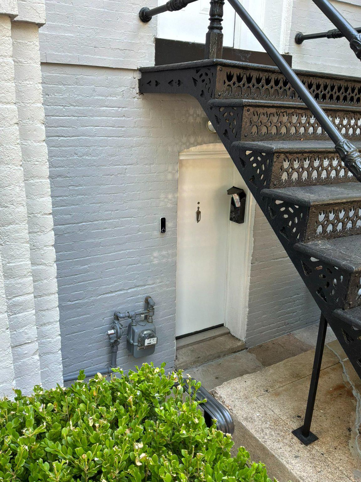 123 7th Street Northeast Washington, DC 20002 - Photo 1 of 7 Private entrance under cast iron stairs.