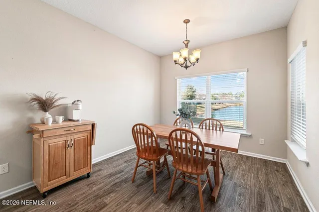 a kitchen with stainless steel appliances a sink stove and refrigerator