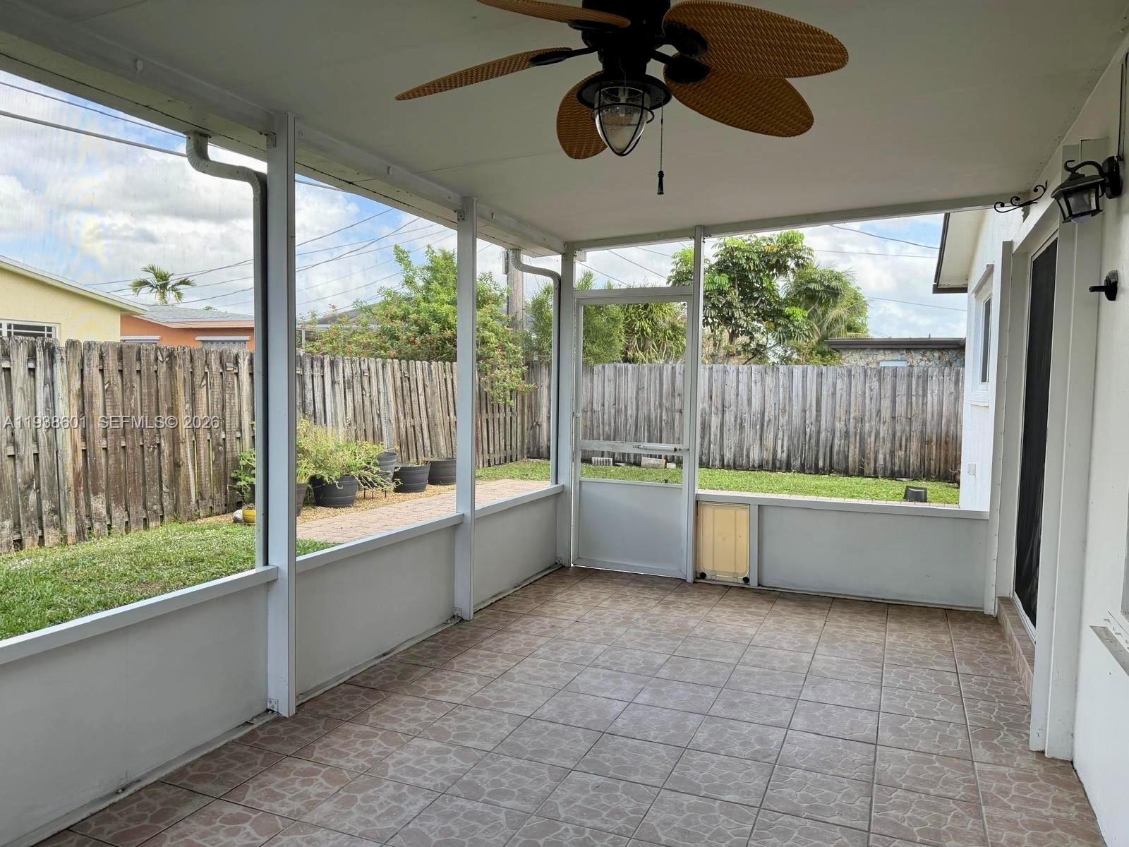 9181 Southwest 55th Street Cooper City, FL 33328 - Photo 6 of 7 a large swimming pool with a outdoor seating