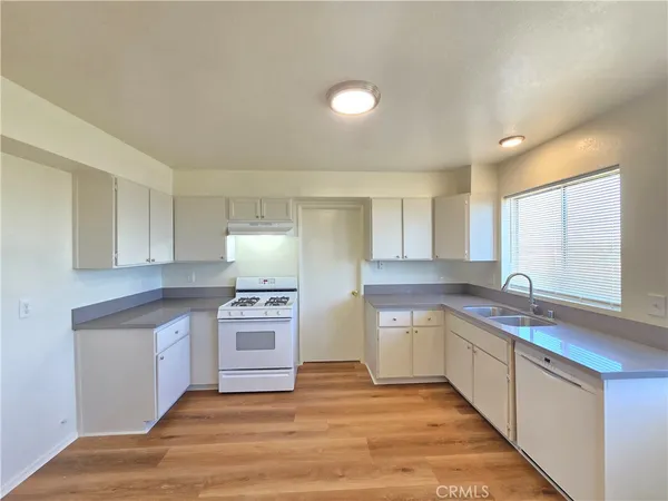 a bathroom with a sink toilet tub and shower