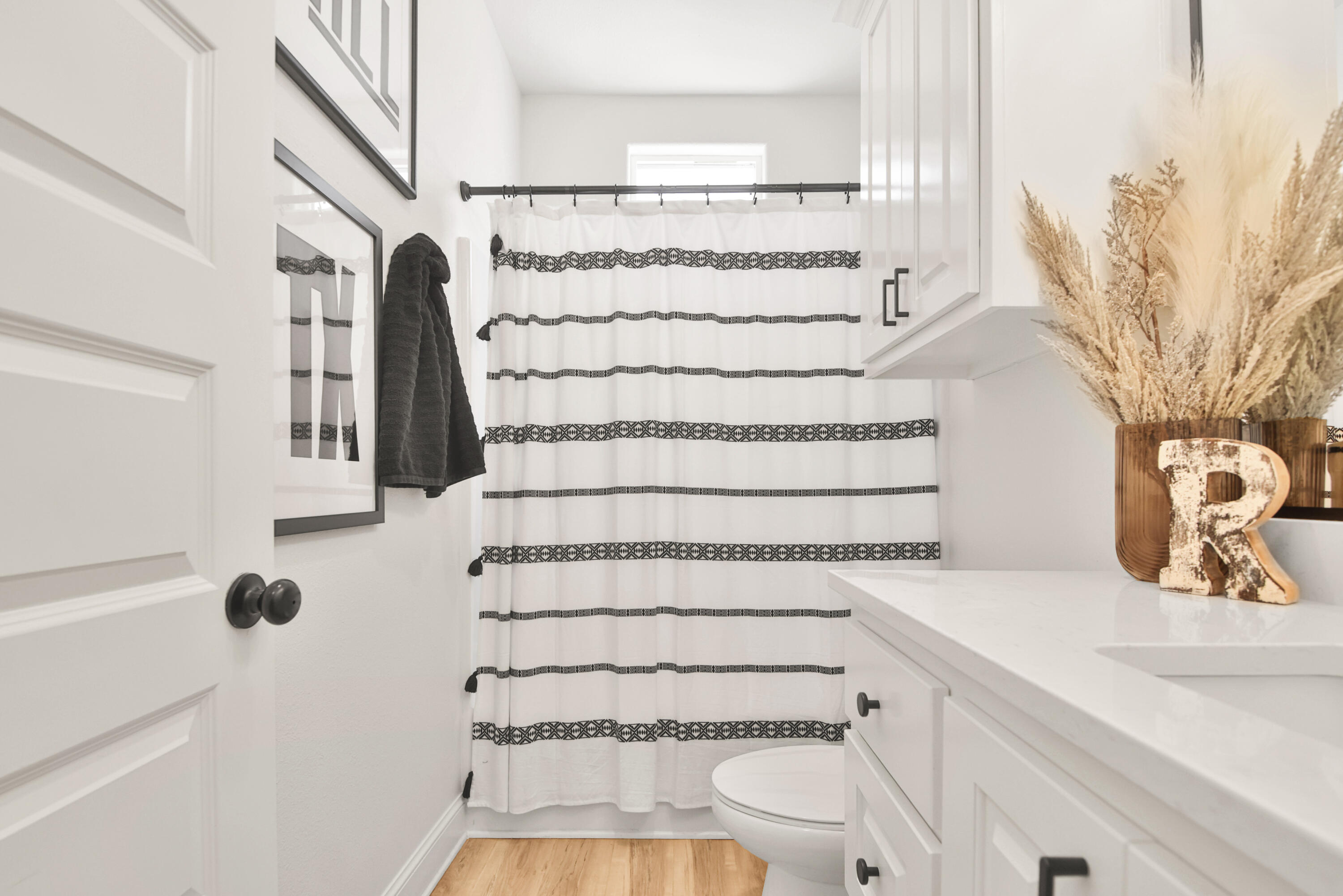 3706 144th Street Lubbock, TX 79423 - Photo 16 of 36 a bathroom with a bathtub and shower