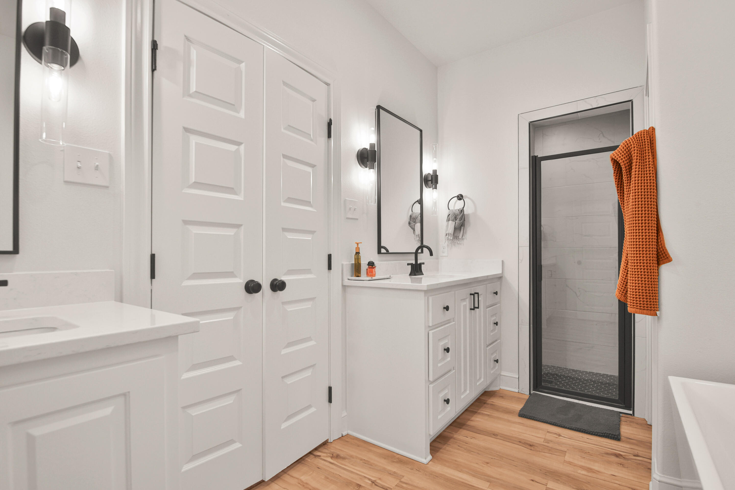 3706 144th Street Lubbock, TX 79423 - Photo 31 of 36 a bathroom with a sink and a mirror