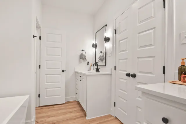 a bathroom with a sink and a mirror