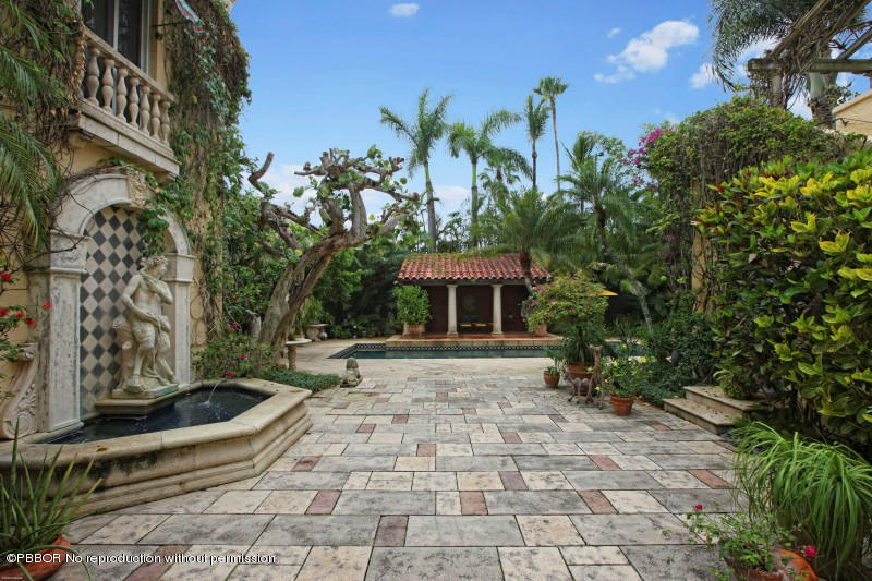 322 Clarke Avenue Palm Beach, FL 33480 - Photo 13 of 28 a view of a yard with plants and trees