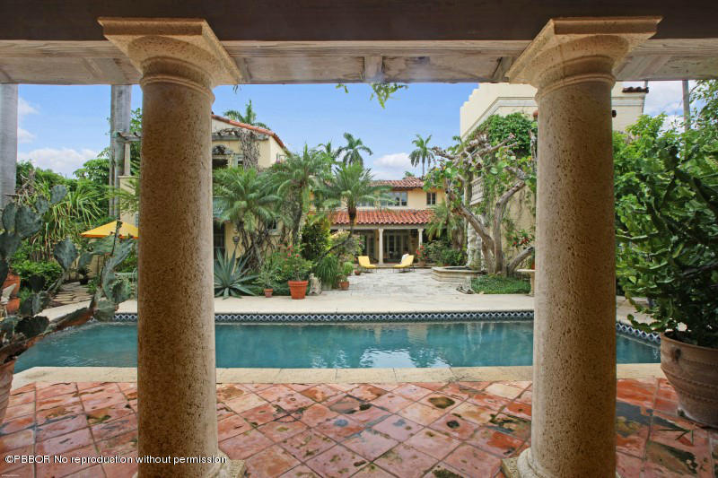 322 Clarke Avenue Palm Beach, FL 33480 - Photo 17 of 28 a front view of a house with garden