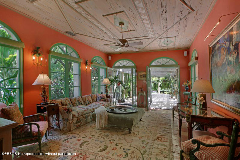 322 Clarke Avenue Palm Beach, FL 33480 - Photo 5 of 28 a living room with furniture a chandelier and a large window
