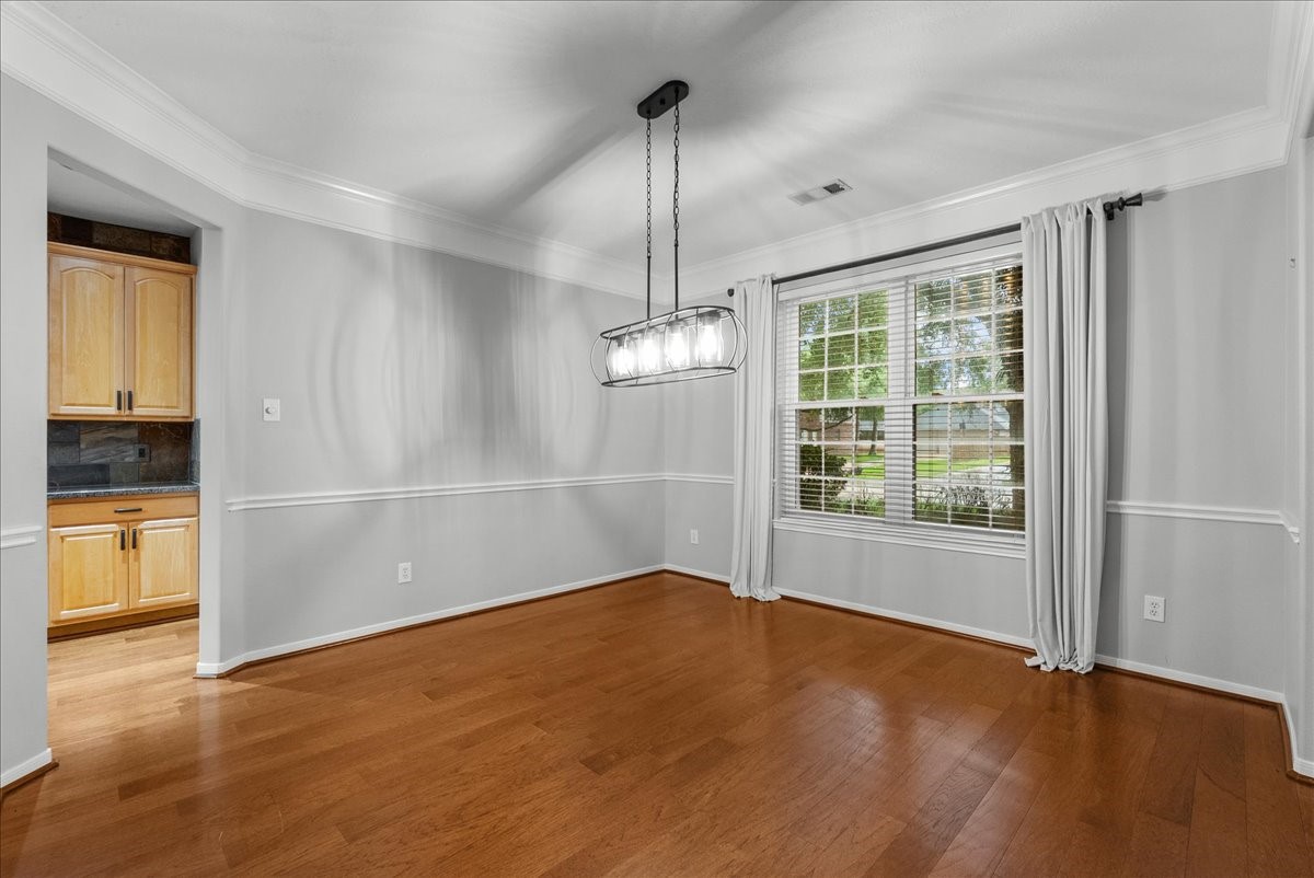 2876 Match Point Lane Friendswood, TX 77546 - Photo 7 of 45 Spacious formal dining