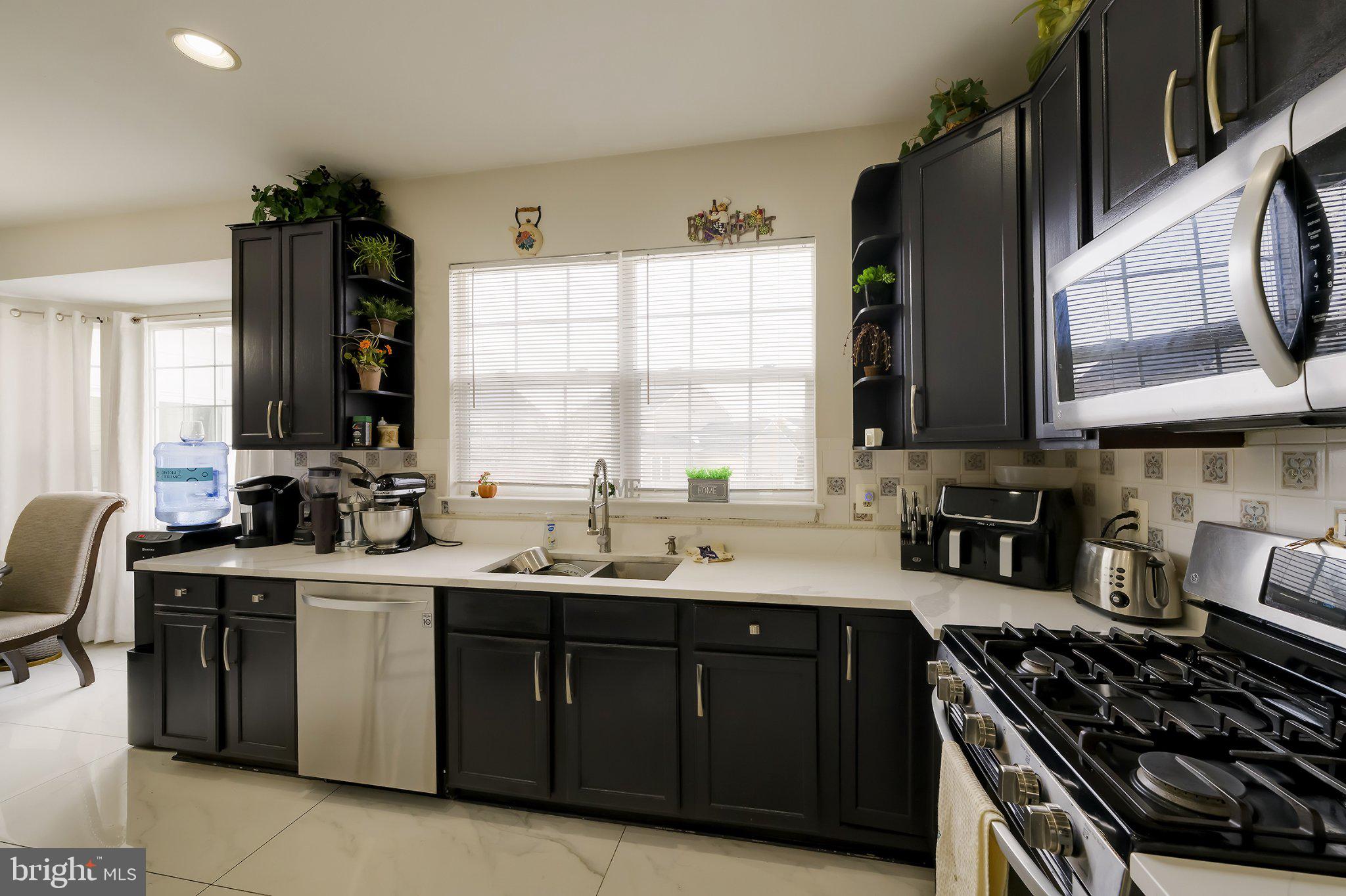 601 Crossover Court Frederick, MD 21703 - Photo 33 of 55 Modern kitchen with sleek cabinetry.