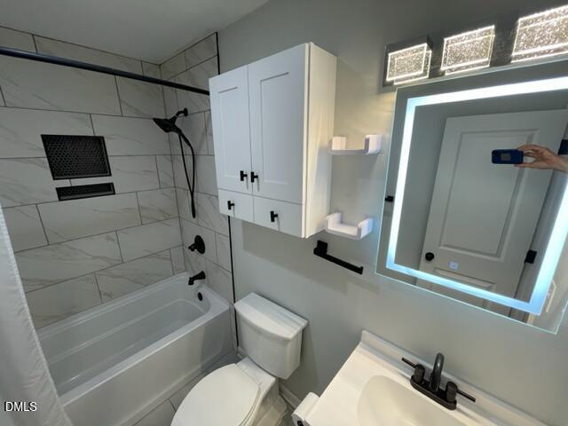 4804 Hoyle Drive, Unit A Raleigh, NC 27604 - Photo 12 of 19 a bathroom with a toilet a sink and bathtub