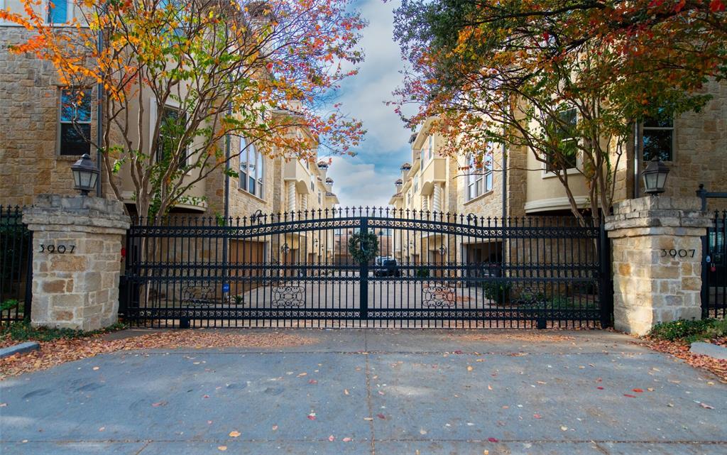 a view of a wrought iron fences in front of house
