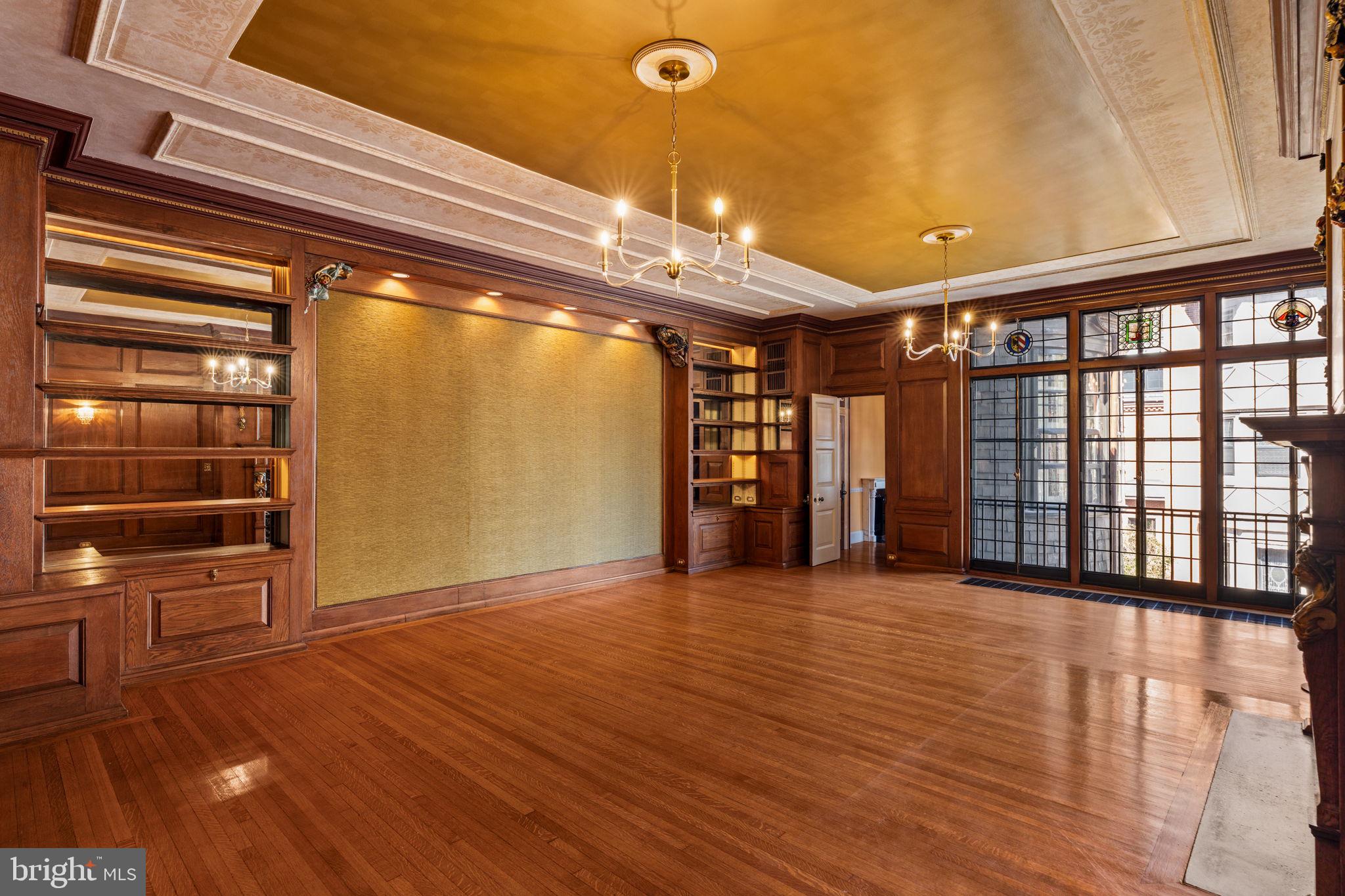 2013 Delancey Place Philadelphia, PA 19103 - Photo 30 of 79 a view of an empty room with wooden floor and windows