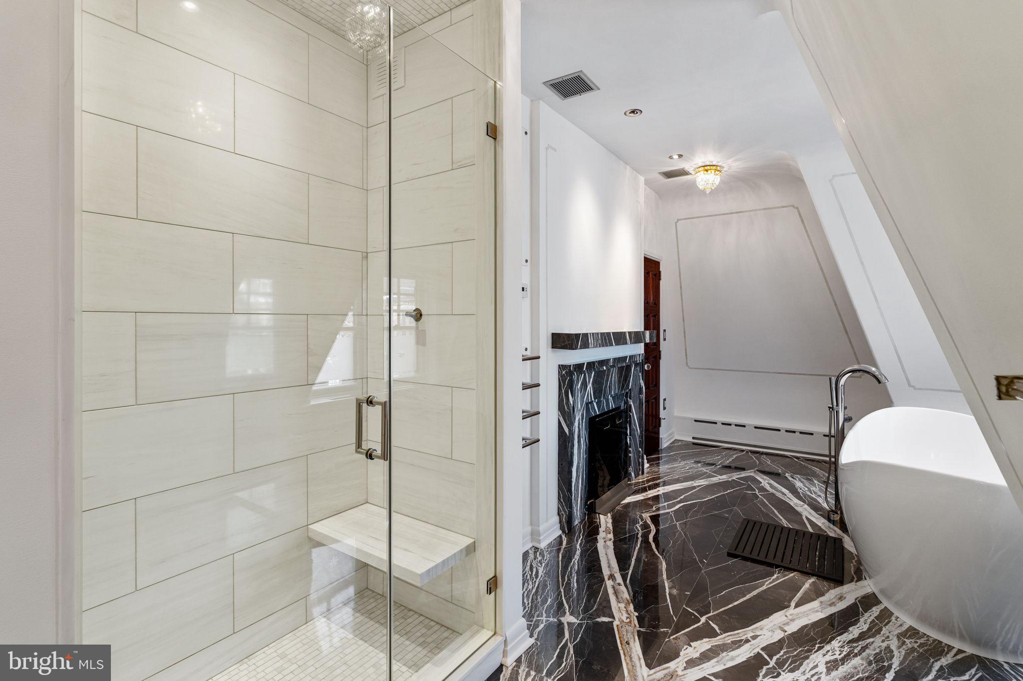 2013 Delancey Place Philadelphia, PA 19103 - Photo 44 of 79 a bathroom with a bathtub and double sink