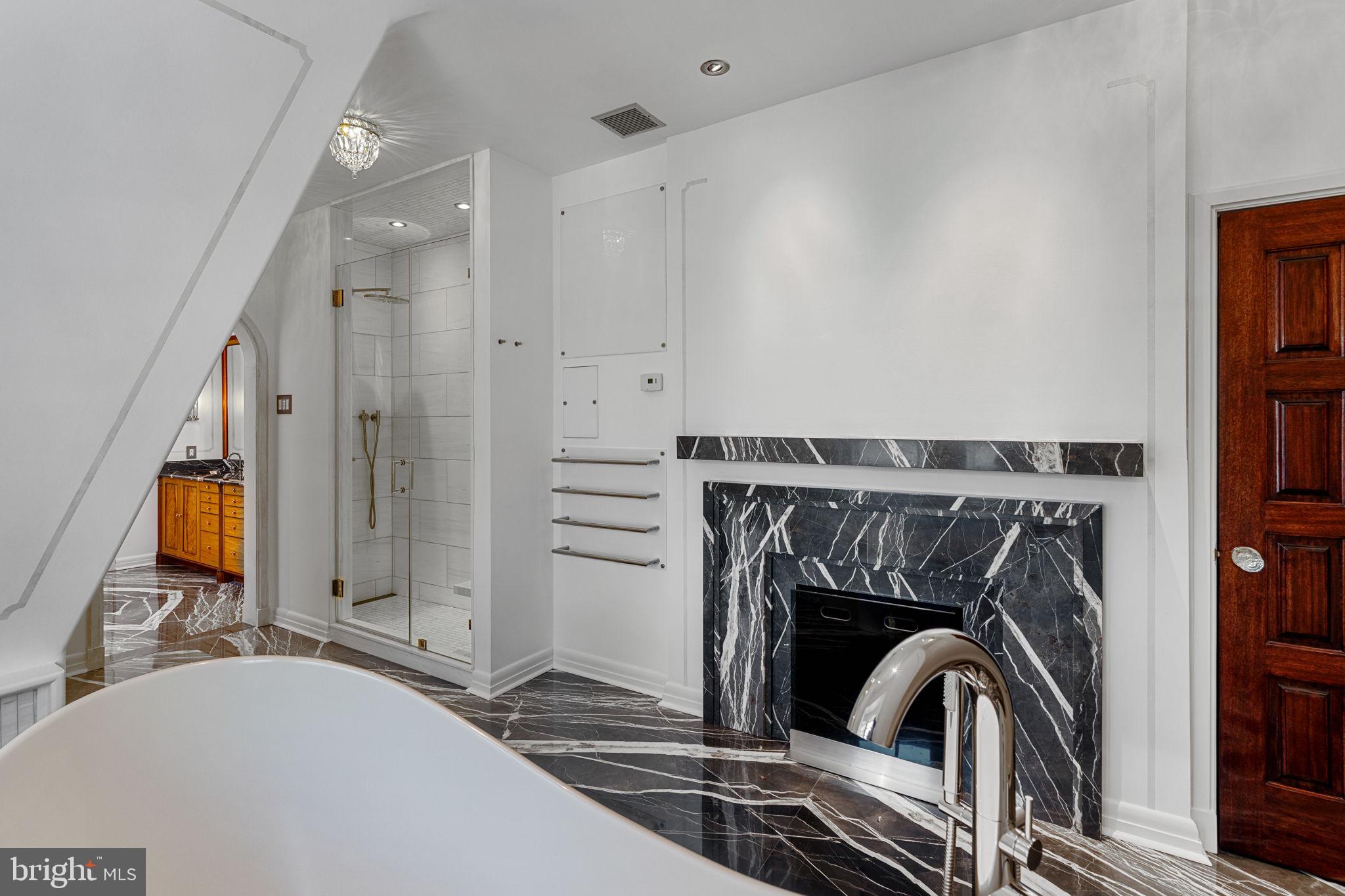 2013 Delancey Place Philadelphia, PA 19103 - Photo 47 of 79 Primary Bathroom - working wood fireplace