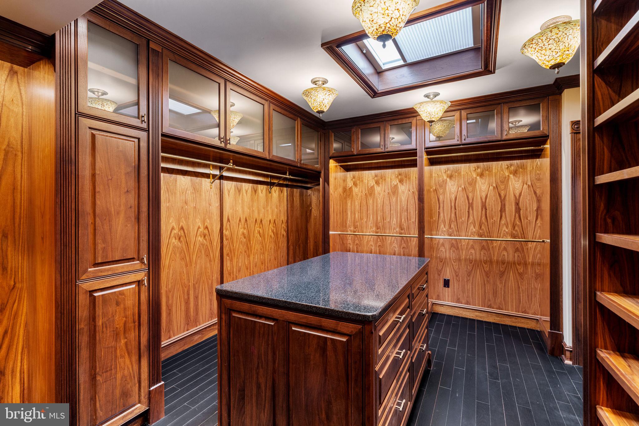 2013 Delancey Place Philadelphia, PA 19103 - Photo 63 of 79 a view of walk in closet with window and wooden floor
