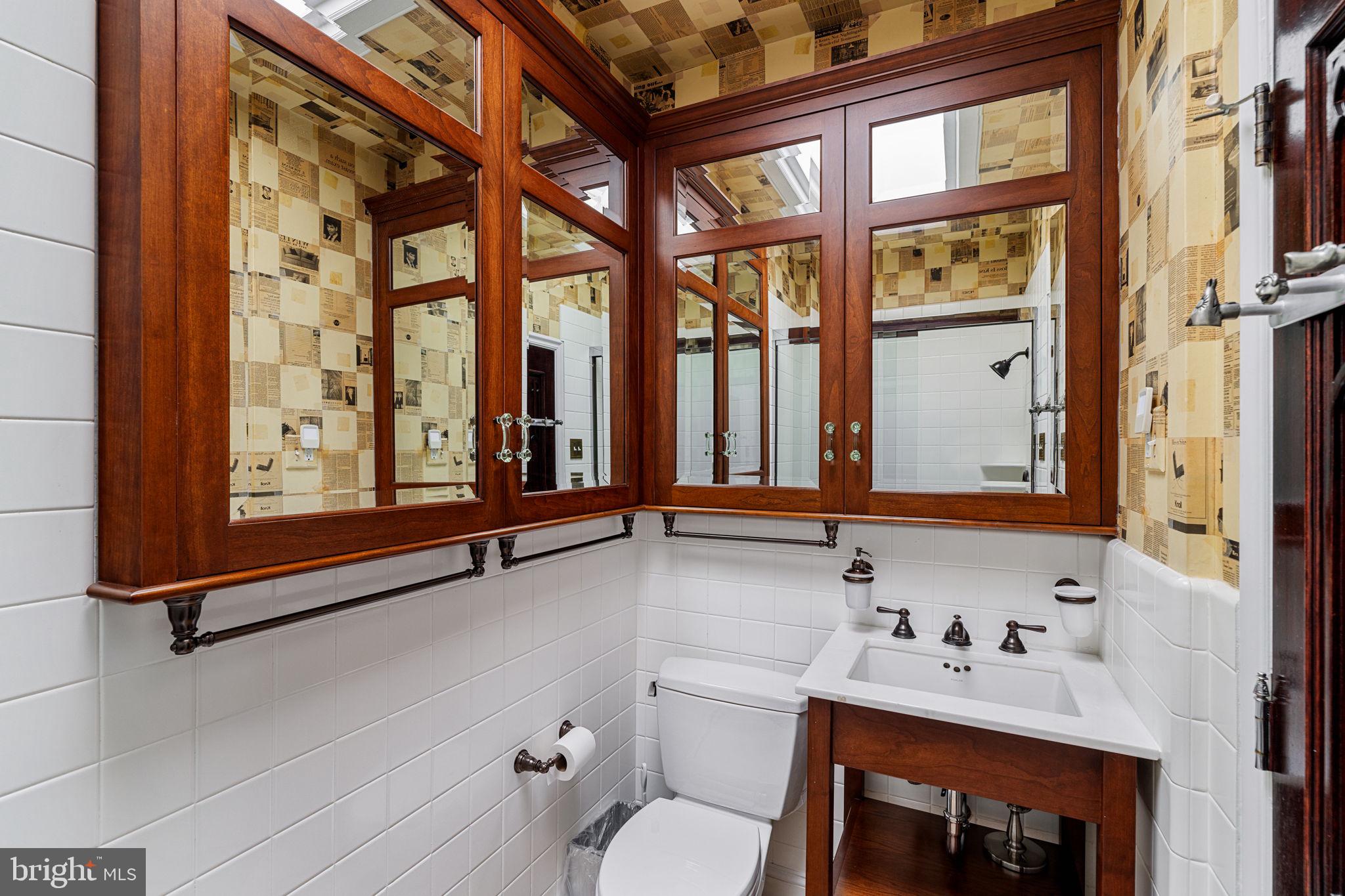 2013 Delancey Place Philadelphia, PA 19103 - Photo 65 of 79 a bathroom with a sink and a mirror