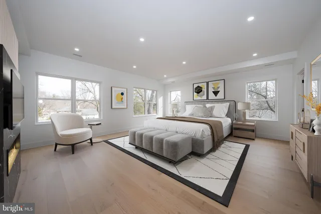 a kitchen with granite countertop a stove and a refrigerator