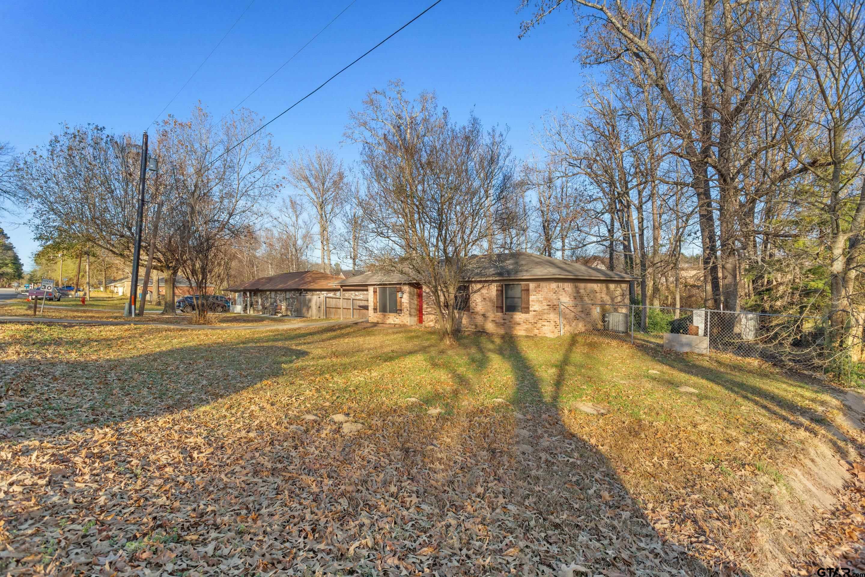 1106 Brad Circle Lindale, TX 75771 - Photo 17 of 27 a view of yard with swimming pool