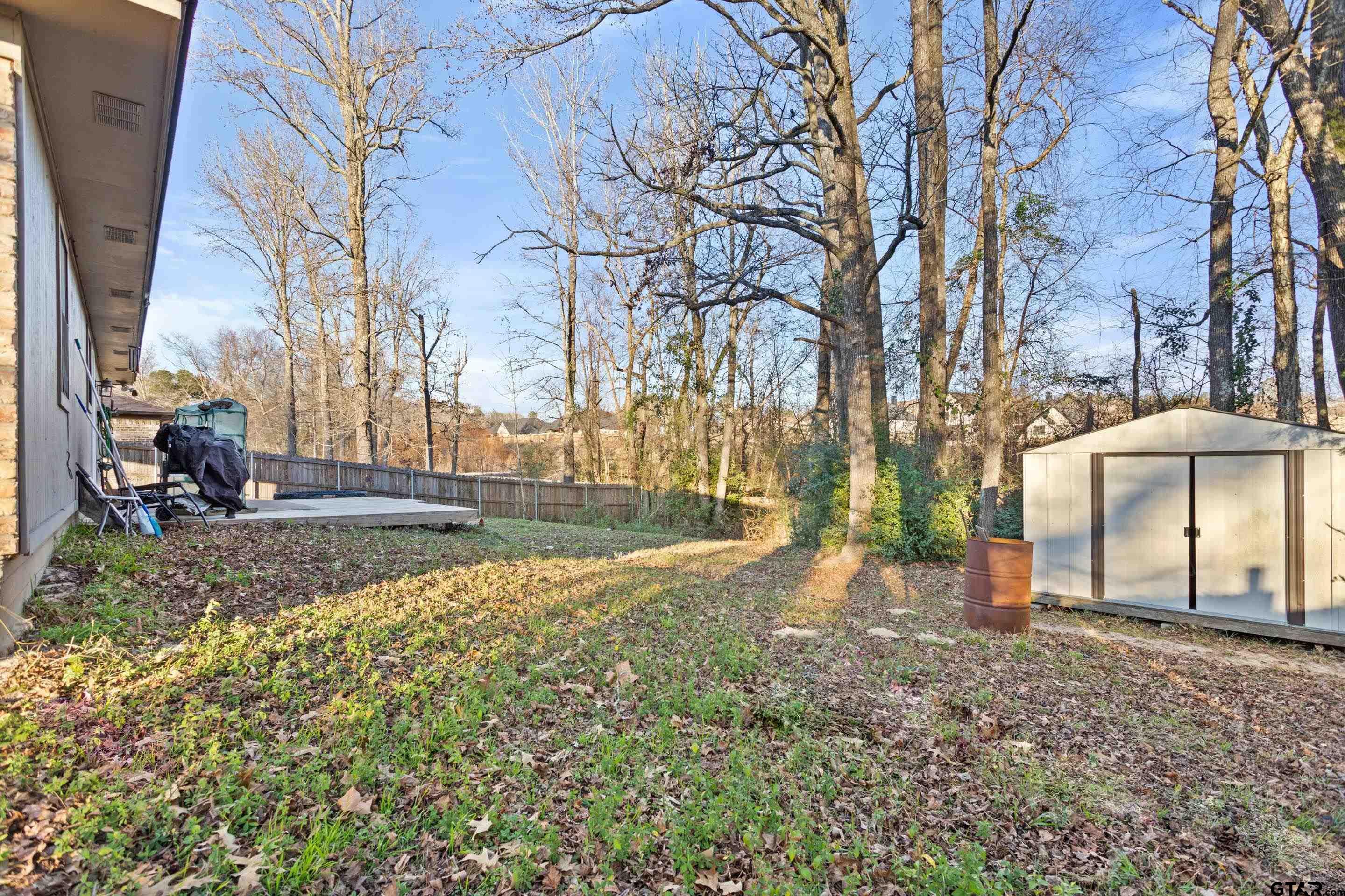 1106 Brad Circle Lindale, TX 75771 - Photo 23 of 27 a view of a yard with a house