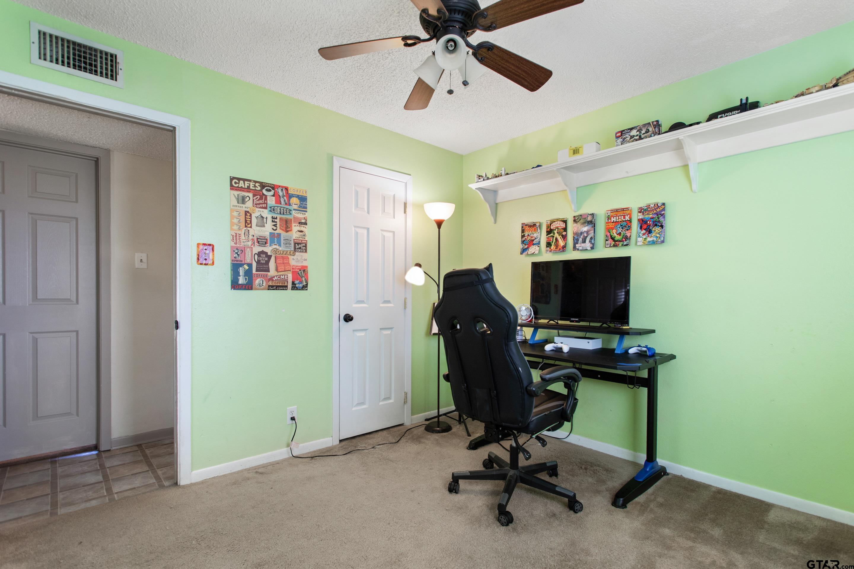 1106 Brad Circle Lindale, TX 75771 - Photo 27 of 27 a view of a workspace with furniture and a window