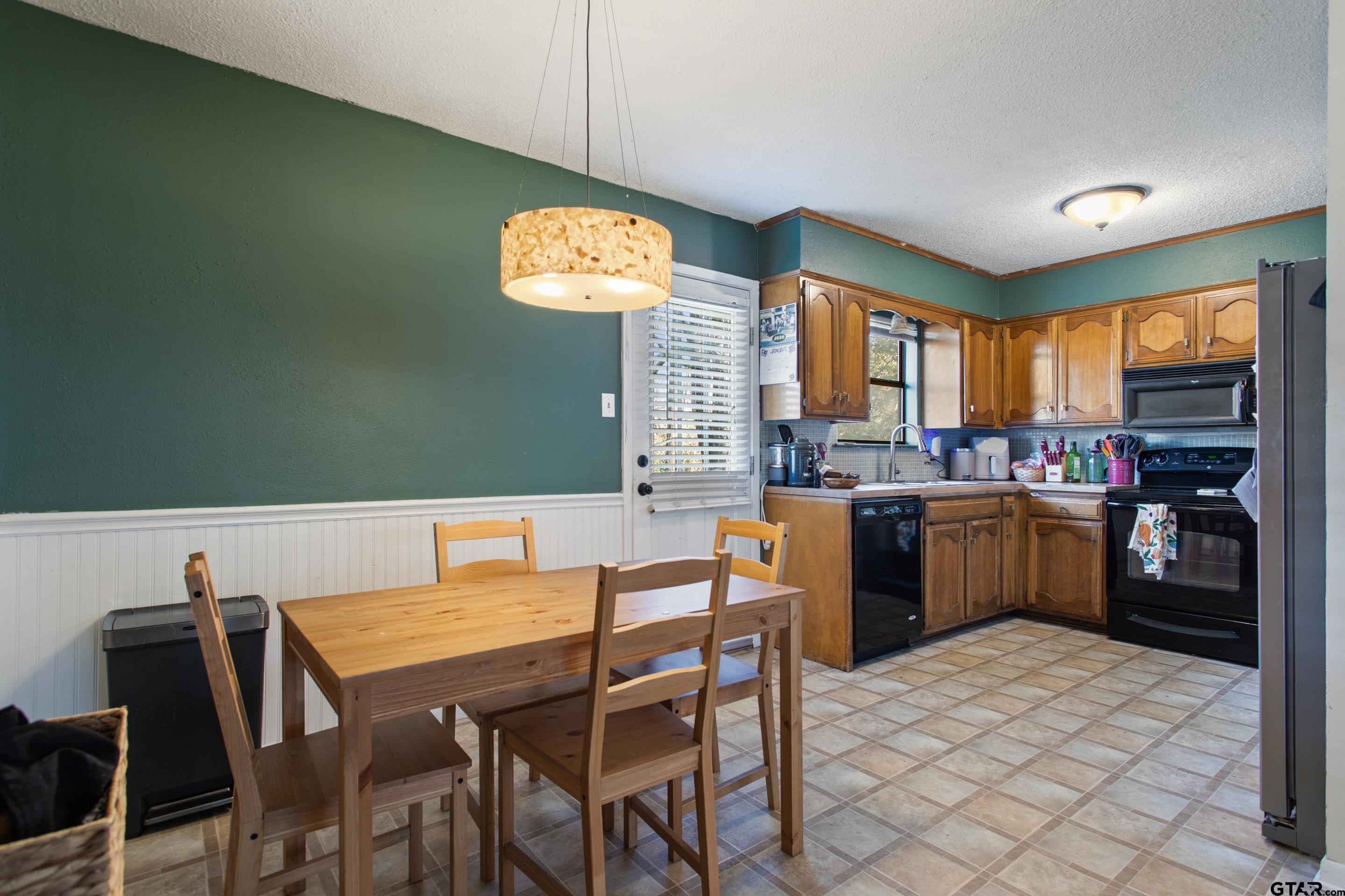1106 Brad Circle Lindale, TX 75771 - Photo 3 of 27 a view of a dining room with furniture