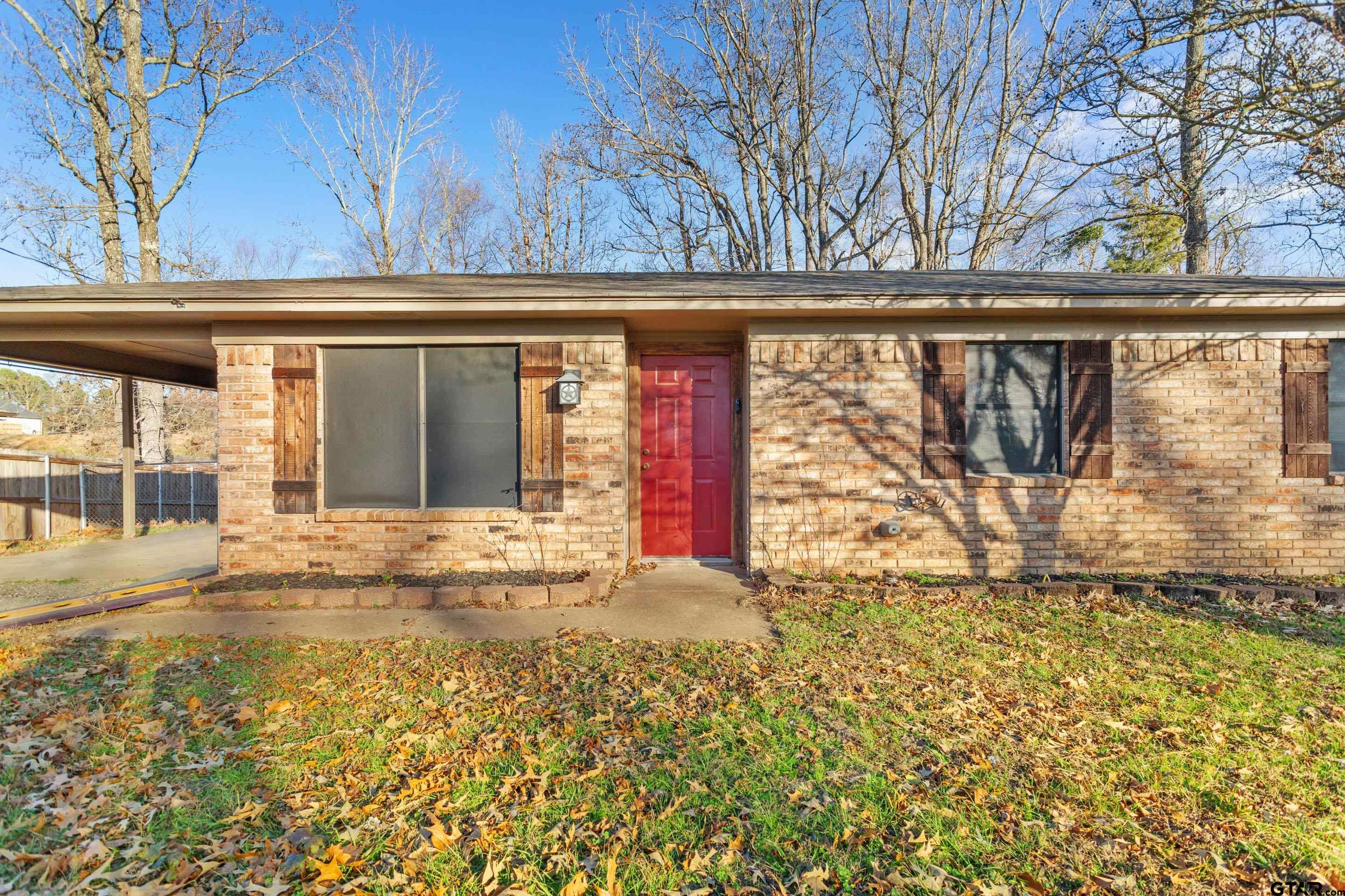 1106 Brad Circle Lindale, TX 75771 - Photo 6 of 27 front view of a house with a large window