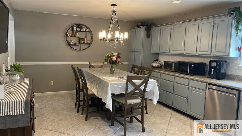 102 Gracey Street Edison, NJ 08817 - Photo 5 of 16 a view of a dining room and chandelier