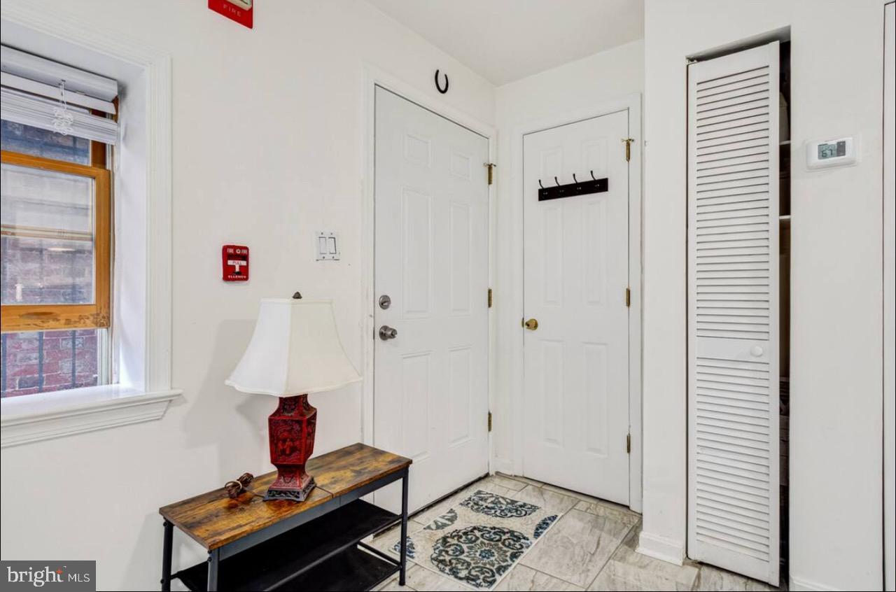 623 5th Street Northeast, Unit 6 Washington, DC 20002 - Photo 2 of 15 a living room with furniture and a window