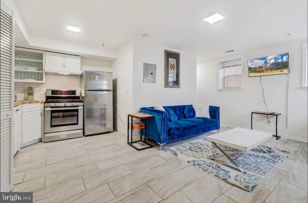 623 5th Street Northeast, Unit 6 Washington, DC 20002 - Photo 3 of 15 a living room with furniture