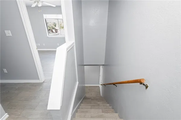 a view of walk in closet with clothes