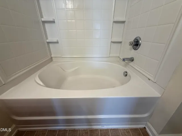 a bathroom with a bathtub