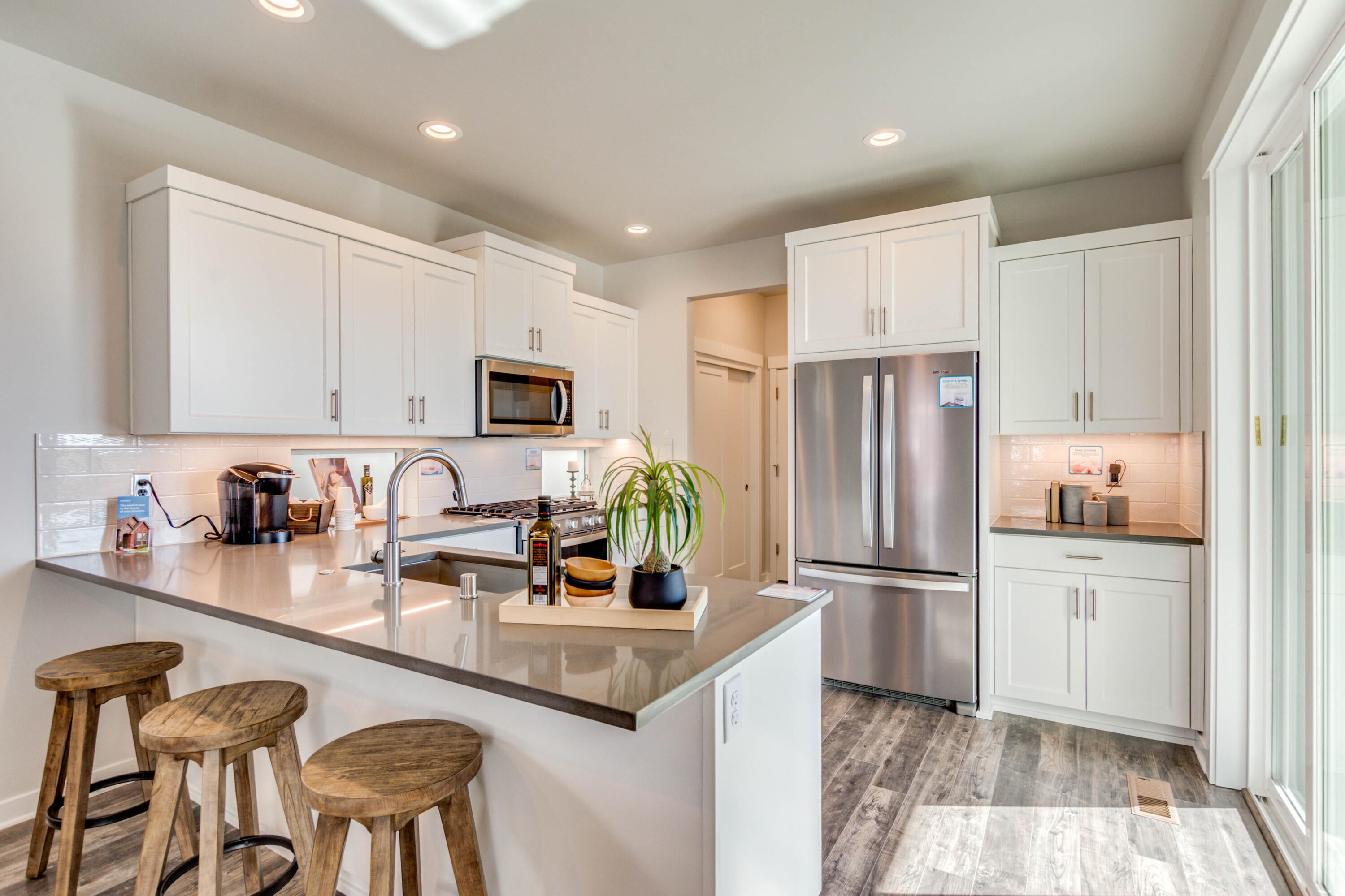 4649 Southwest 36th Street Redmond, OR 97756 - Photo 4 of 47 Kitchen with eating bar. Refrigerator upgrade is not available. Specs vary.