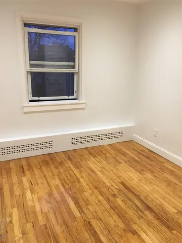 a view of a hardwood & staircase