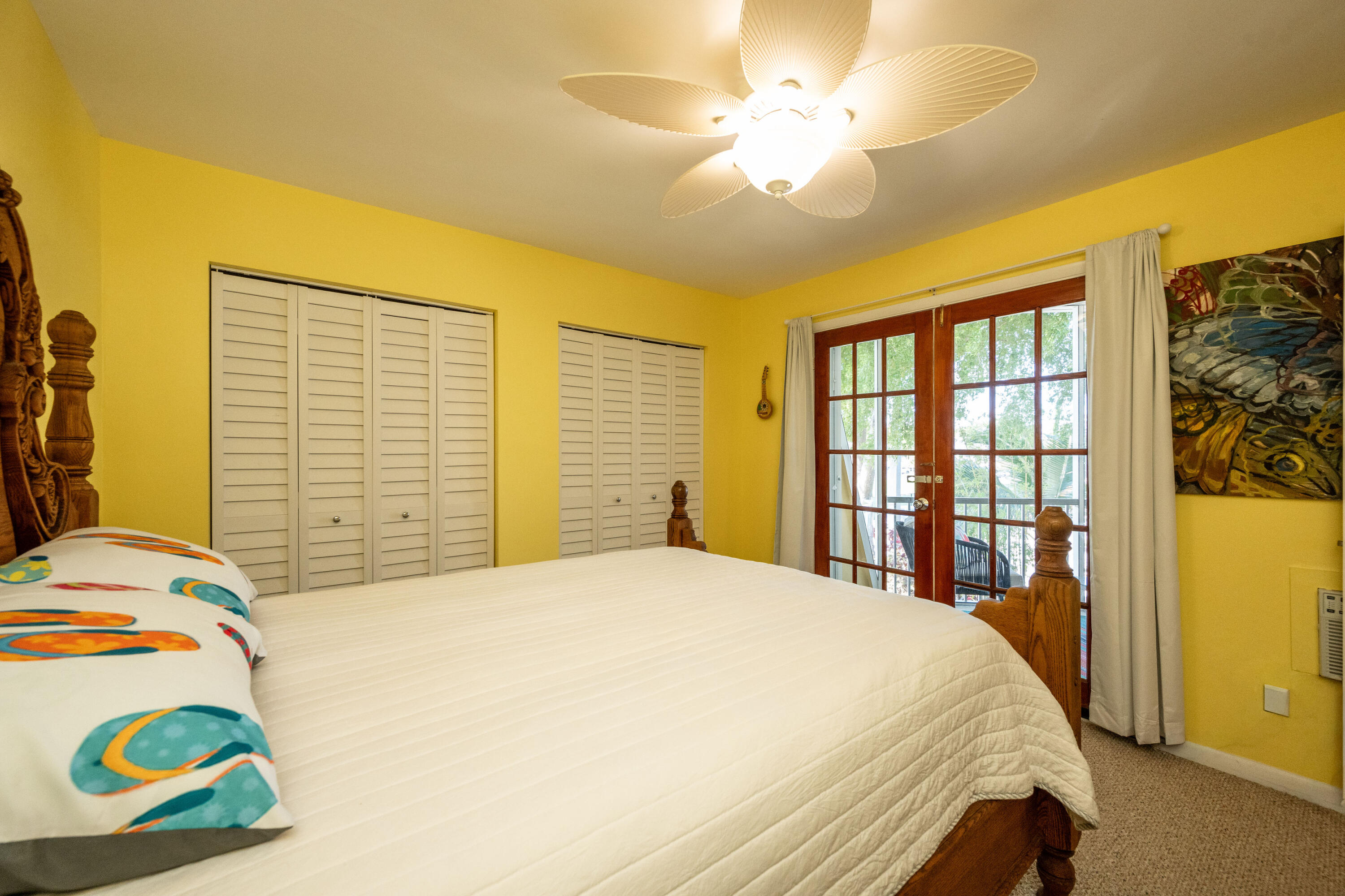 3200 Eagle Avenue Key West, FL 33040 - Photo 21 of 25 a bedroom with a bed and a window