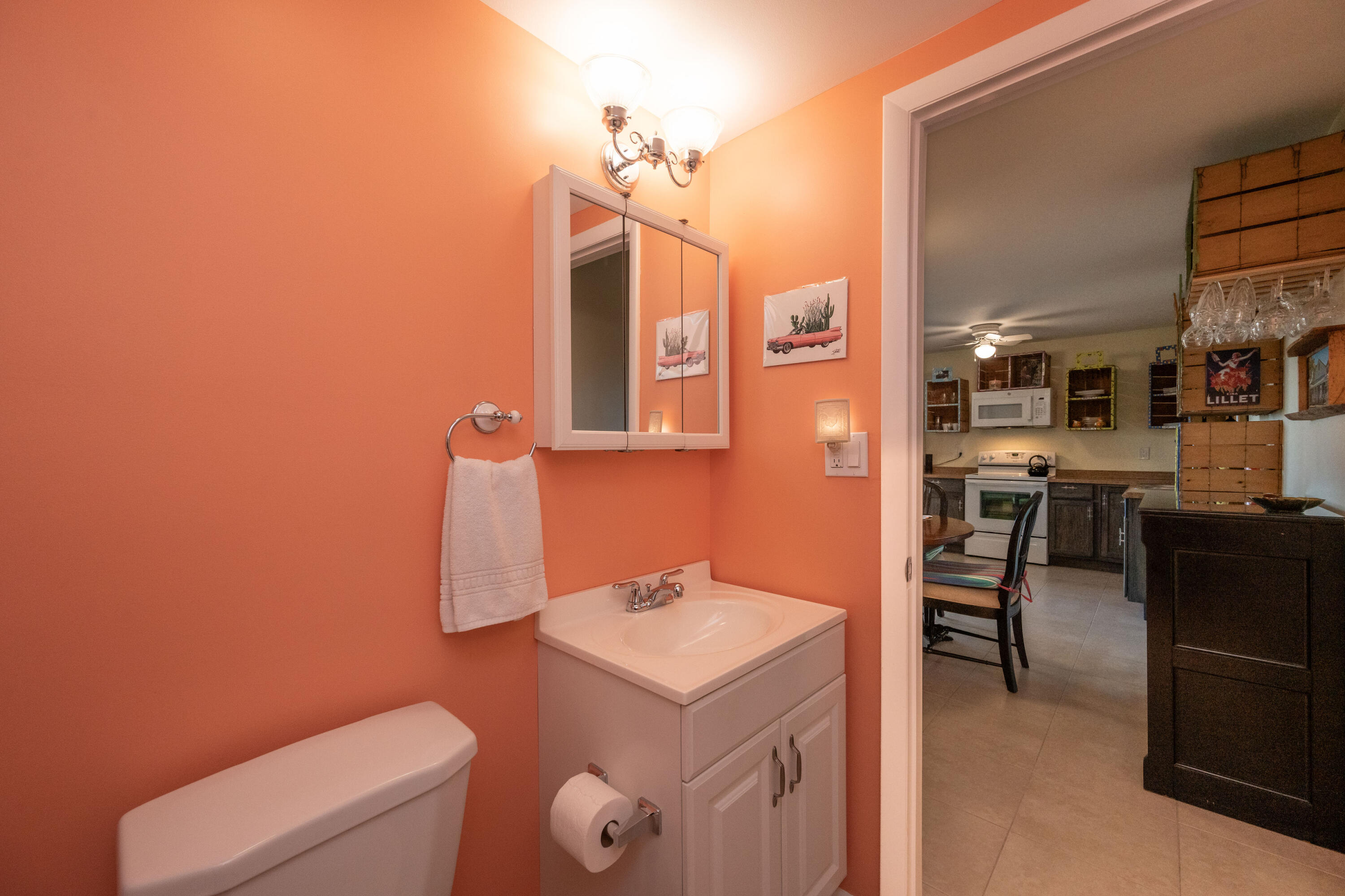 3200 Eagle Avenue Key West, FL 33040 - Photo 10 of 25 a bathroom with a sink a toilet and mirror