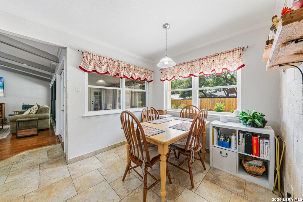 6022 Winding Ridge Drive Windcrest, TX 78239 - Photo 13 of 31 a dining room with furniture outdoor view and garden view