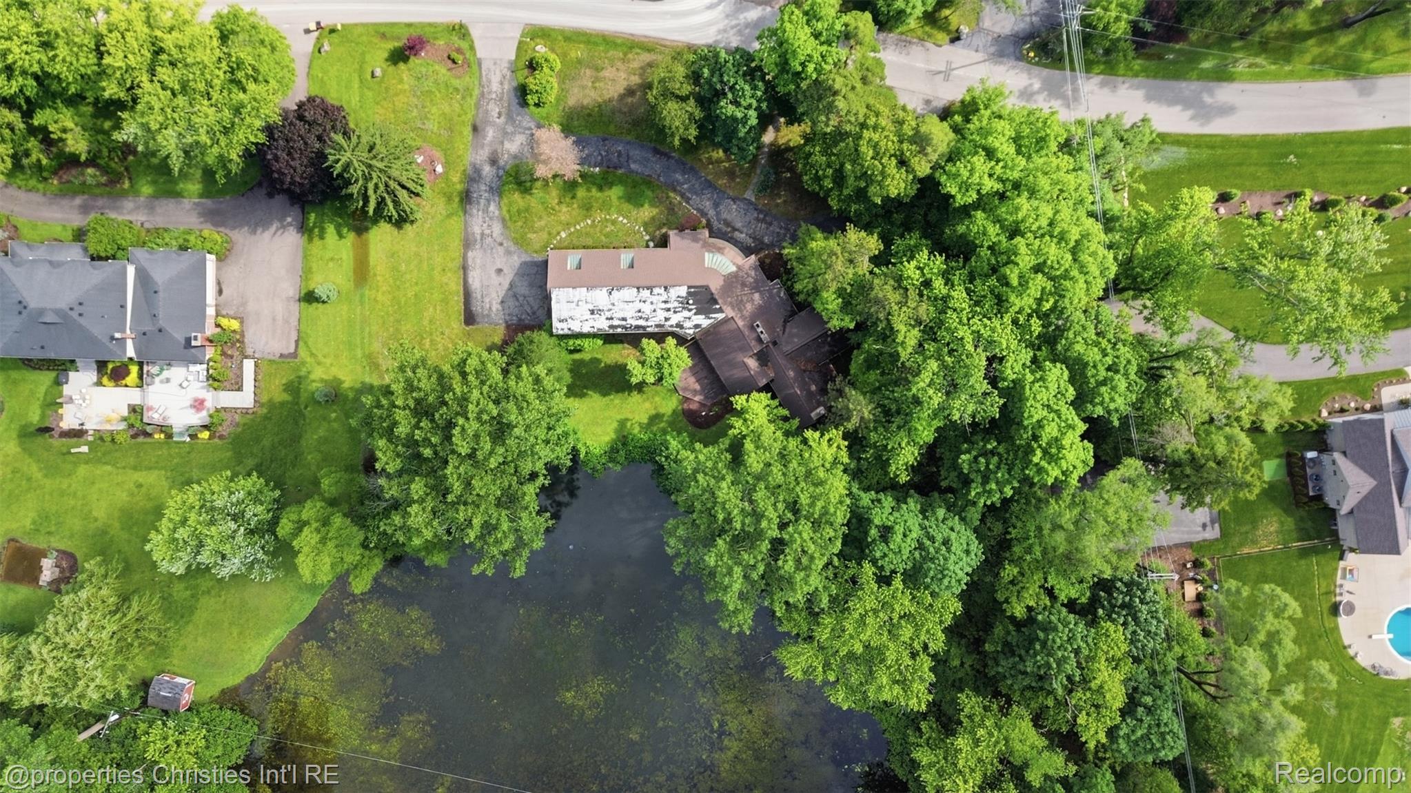 25310 Canterbury Road Franklin, MI 48025 - Photo 6 of 55 Aerial view of rear yard and pond