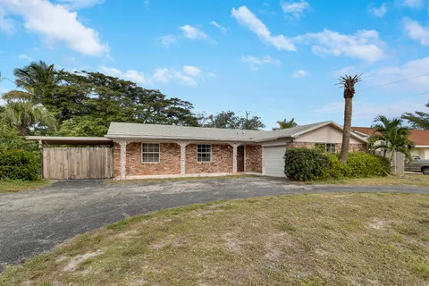 $450,000 | 935 Orange Drive, Lake Park, FL 33403