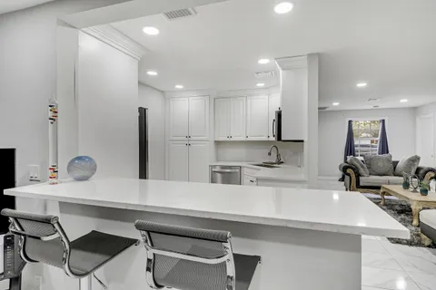 $450,000 | 935 Orange Drive, Lake Park, FL 33403