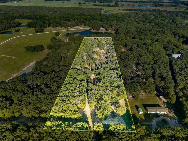 a view of a lake with outdoor space