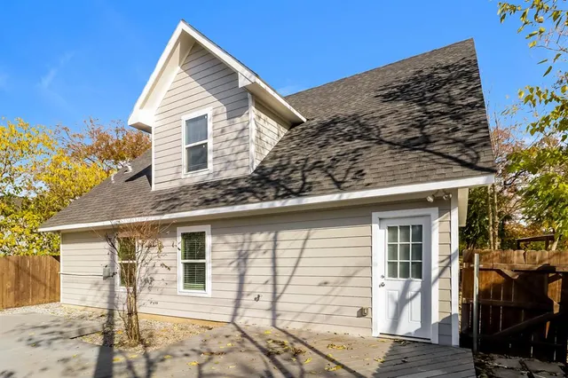 a view of a house with a iron stairs